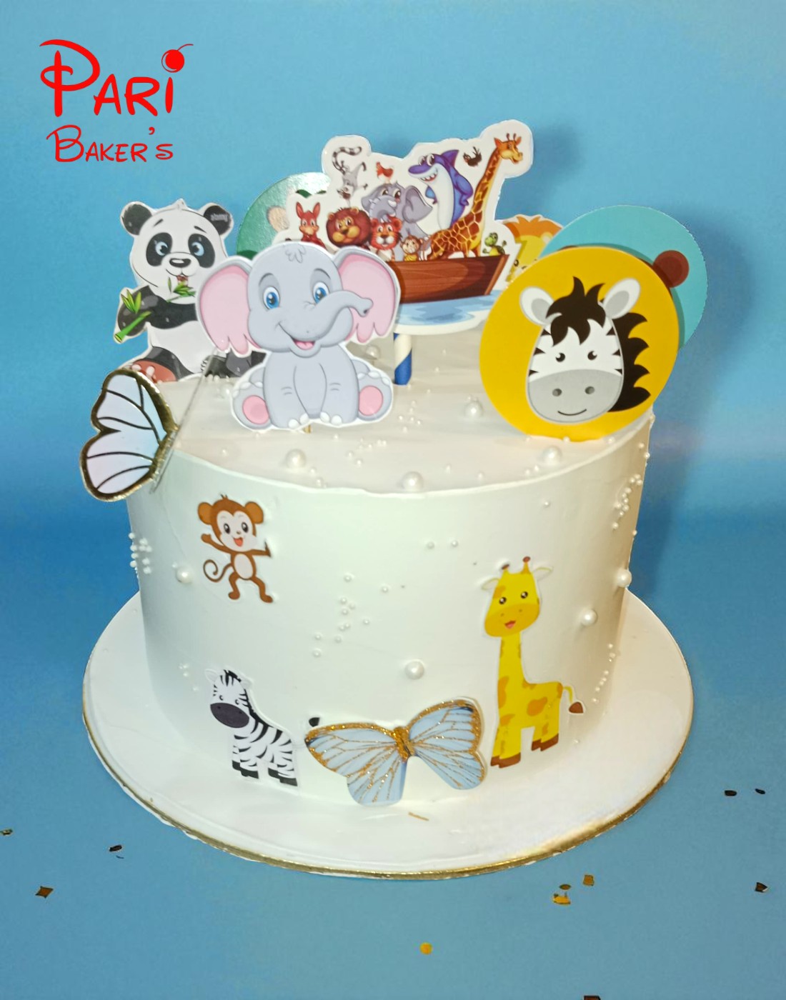 white colored animal theme cake white colored animal theme cake